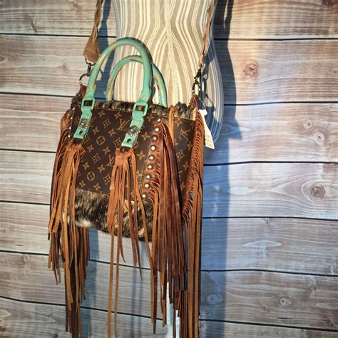 cowhide lv purse